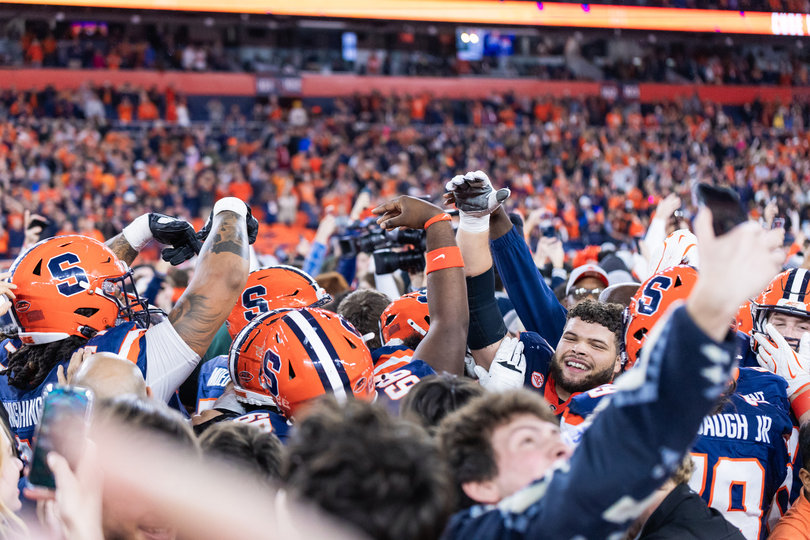 Nov. 30, 2024: Syracuse Football upsets then-No. 8 Miami to knock the Hurricanes out of the College Football Playoff. Students and fans rushed Ernie Davis Legends Field to celebrate the Orange’s first AP top-10 win since 2017.