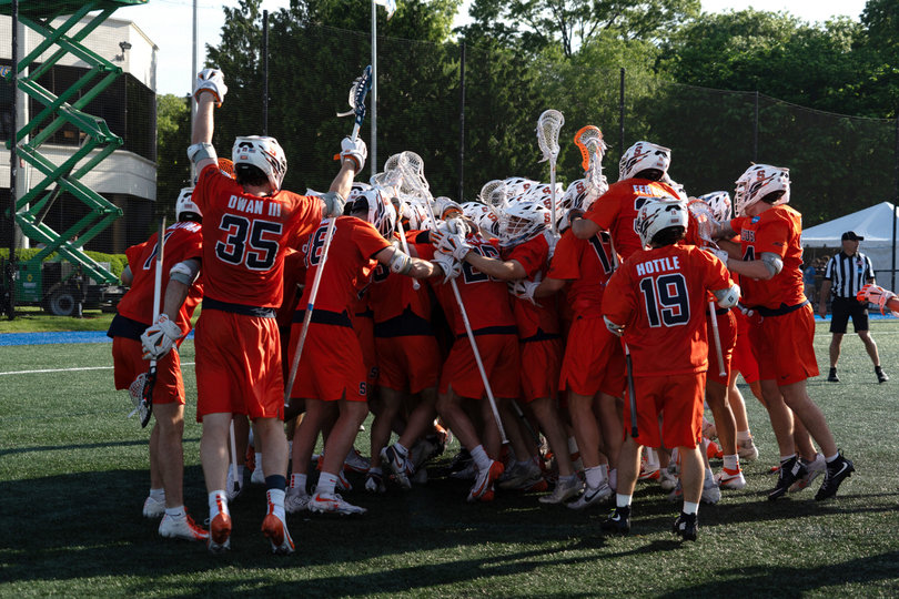 Syracuse celebrates on the field after it defeated No. 3 seed Princeton 19-18 Saturday in Hempstead, New York. The victory clinched the Orange’s first Final Four berth since 2013, when it finished as the runner-up.
