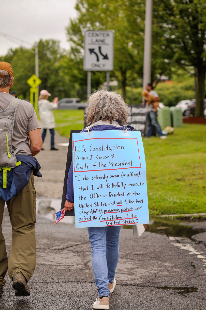 ALBANY, NY — “No Kings” protesters lined the streets of Albany Saturday afternoon clad with cardboard signs, flags and noise makers. The posters and signs created by protesters addressed Trump’s alleged wrongdoings, drawing on the U.S. Constitution and checks and balances. 