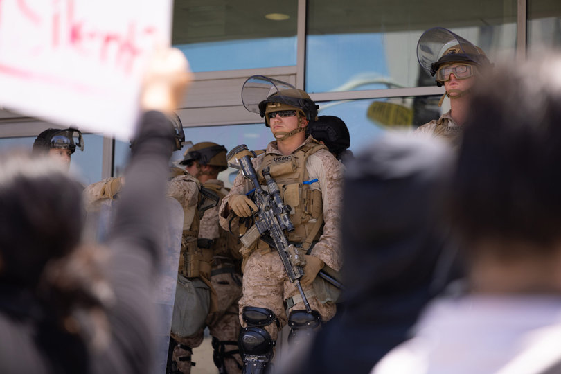 LOS ANGELES, CA — Protesters shout “shame“ at the U.S. Marines lined in front of the Federal Building in downtown Los Angeles. Trump deployed the National Guard and Marines to LA last week, “protecting federal personnel and federal property,” which California Gov. Gavin Newsom denounced. 