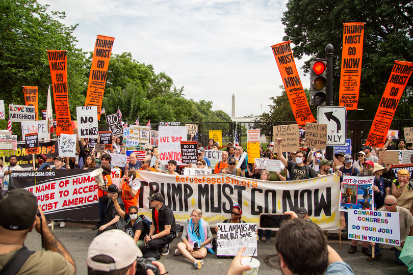 WASHINGTON D.C. — The “Refuse Fascism” organization poses with fellow protesters in front of the White House. While no official “No Kings” protest was scheduled for Washington, D.C., people still demonstrated.