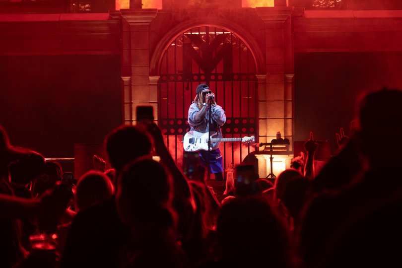 Lil Wayne raps with the crowd as he performs hits from his illustrious hip-hop career. His set list included songs like “Fireman” and “King Carter.”