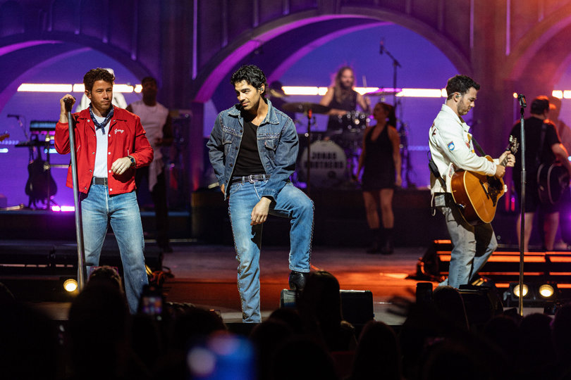 The Jonas Brothers’ “Jonas20: Greetings from Your Hometown” tour commemorates the almost 20 years it’s been since their first single, “Mandy,” debuted in 2005. 