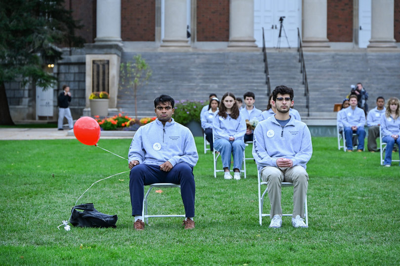 Rohan Bangalore and Nathan Torabi sit in silence for 35 minutes during “Sitting in Solidarity,” reflecting on their honorees and representing the victims of the Pan Am Flight 103 bombing. 