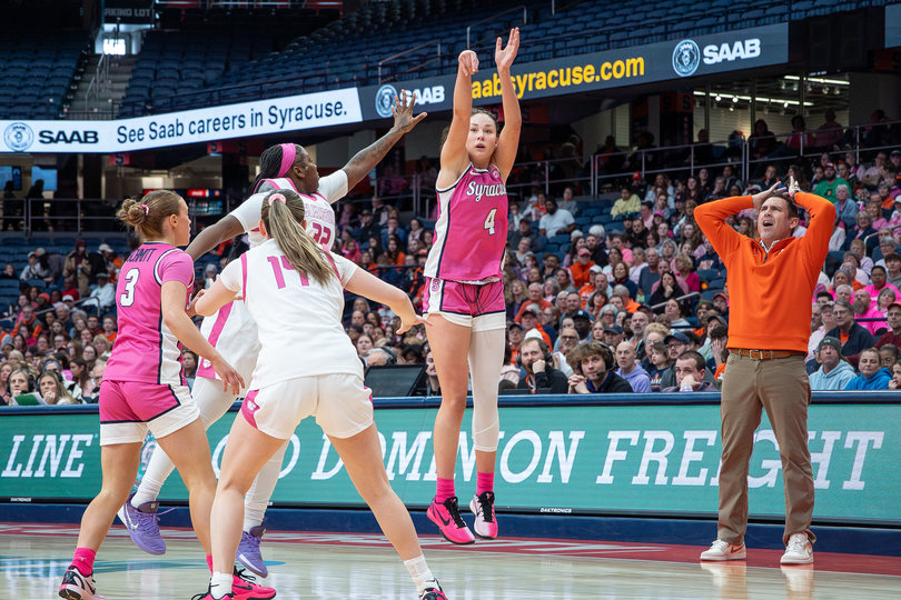 Syracuse women’s basketball’s Sophie Burrows attempts a triple in the Orange’s four-point win over Clemson Sunday. Burrows exploded for a team-high 19 points and a career-best 16 rebounds to propel SU over the Tigers and toward the NCAA Tournament.