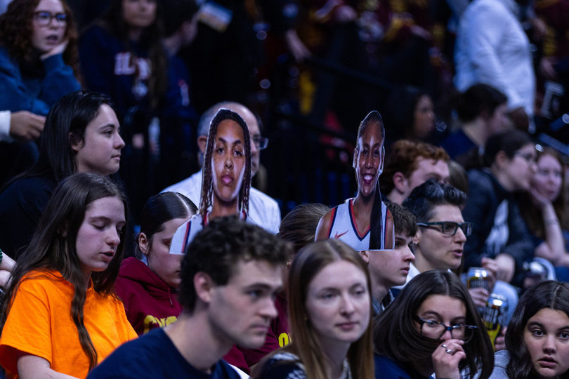 Syracuse fans cheer on forward Shy Hawkins and center Uche Izoje from the stands at Gampel Pavilion. The Orange were crushed by the Huskies, but enjoyed a 24-9 season overall, a major turnaround from last year’s 12-18 campaign. 