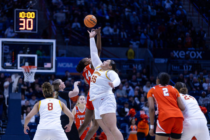 SU’s Uche Izoje and Iowa State’s Audi Crooks reach up for the opening tipoff in the Orange’s 72-63 win over the Cyclones in the NCAA Tournament First Round. Izoje and Crooks combined for 60 points, although Syracuse outlasted ISU. 