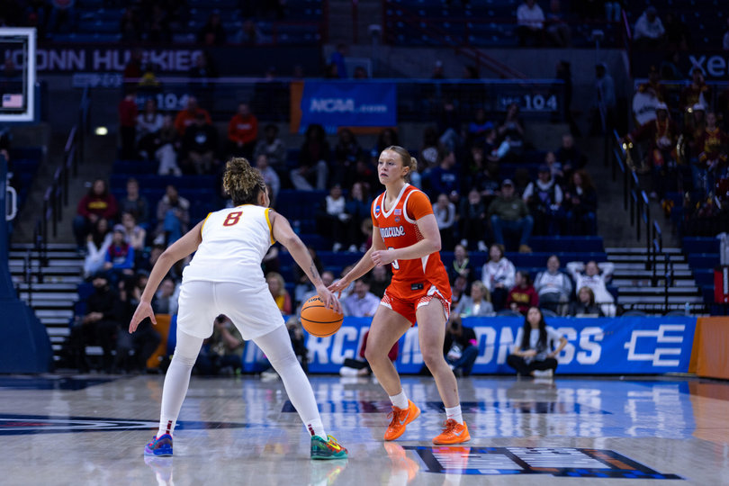 Olivia Schmitt sets up Syracuse’s offense in the first half of the Orange’s first-round win over Iowa State. Schmitt erupted for a career-high 15 points on five made 3-pointers, helping lift SU to the second round. 