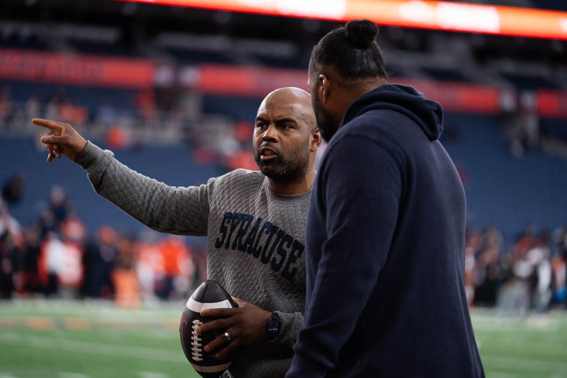 Head coach Fran Brown (left) points toward the field at SU’s spring game. Brown enters his third season in charge of Syracuse in 2026, coming off a disappointing 3-9 2025 campaign.
