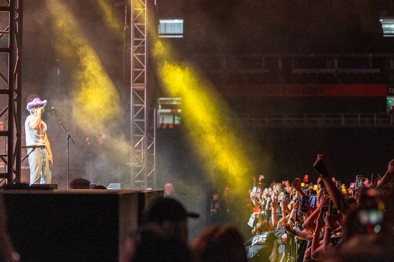 The crowd cheers as Ross Lynch seranades them in the JMA Wireless Dome. Ross even played “On My Own” from his role Brady in Disney Channel’s “Teen Beach 2.”
