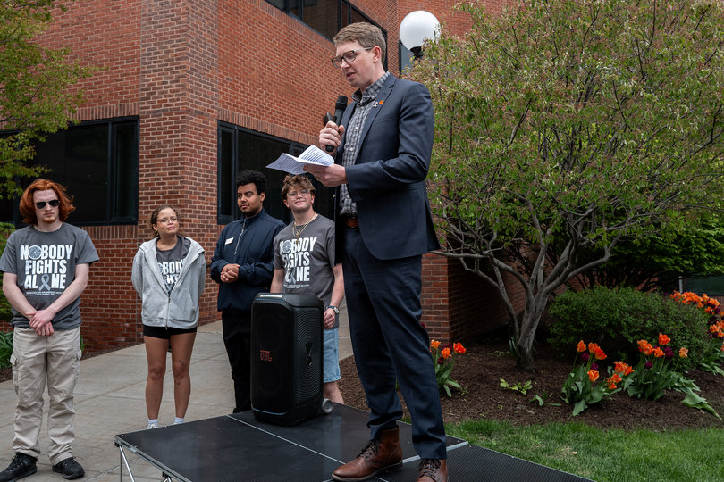 Bartholomew speaks to the crowd, talking about his personal experiences with brain cancer. He shared that, within the past 10 months, two other people he knows have also been diagnosed with the illness.