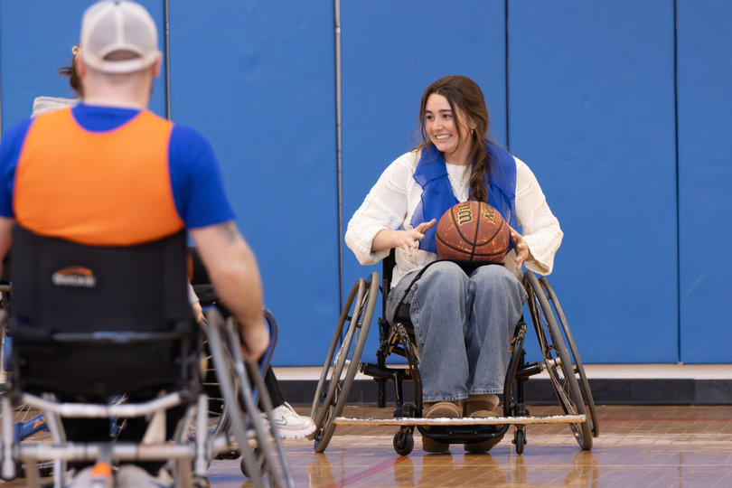 COM 117 students in Seth Gitner’s class play during their class time and determine what to do with the ball. All the students took turns to play in The Barnes Center.