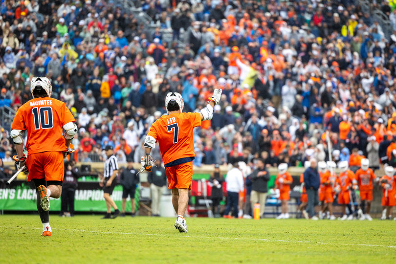 Orange midfielders Michael Leo and McIntee drift toward SU’s sideline. In Leo’s final collegiate game, he was held without a point for the second time this season.