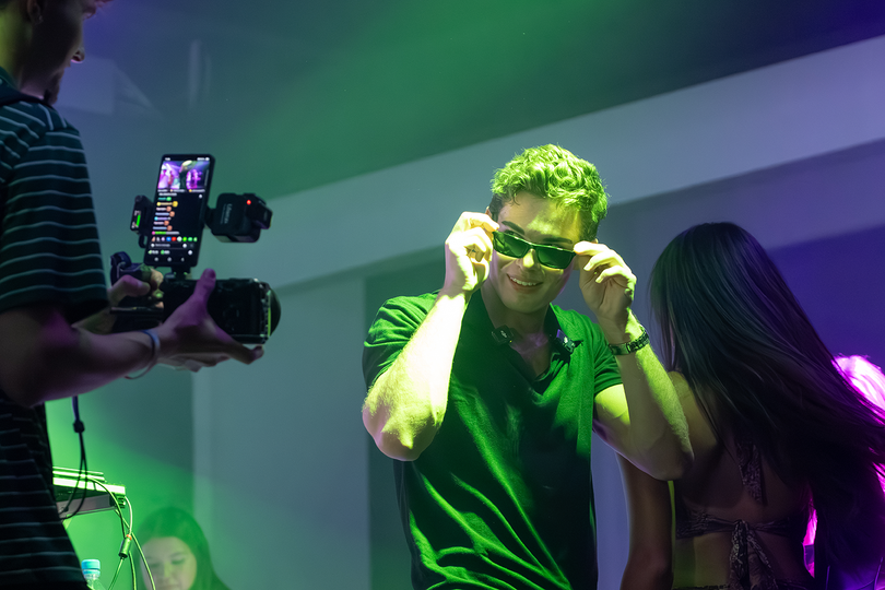 Clavicular lowers his sunglasses during his Friday livestream. While the event was originally scheduled to be held at Westcott Theater, it was moved to Jammer’s Sports Bar & Restaurant.