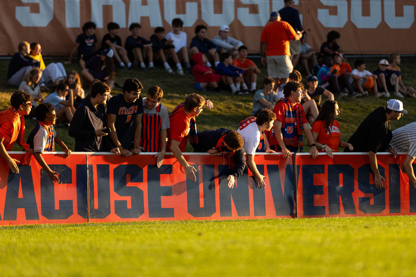 A group of Syracuse fans celebrates at SU men's soccer's win over Loyola on Aug. 28. Ian McIntyre's squad is off to a 3-1 start, giving supporters plenty of optimism as fall sports begin.