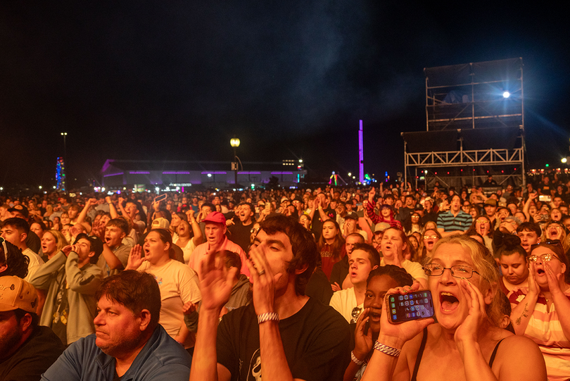 Attendees of the Great New York State Fair cheer during a show. Catch country artist Trace Adkins or Grammy Award winner Wyclef Jean at the Fair this weekend.