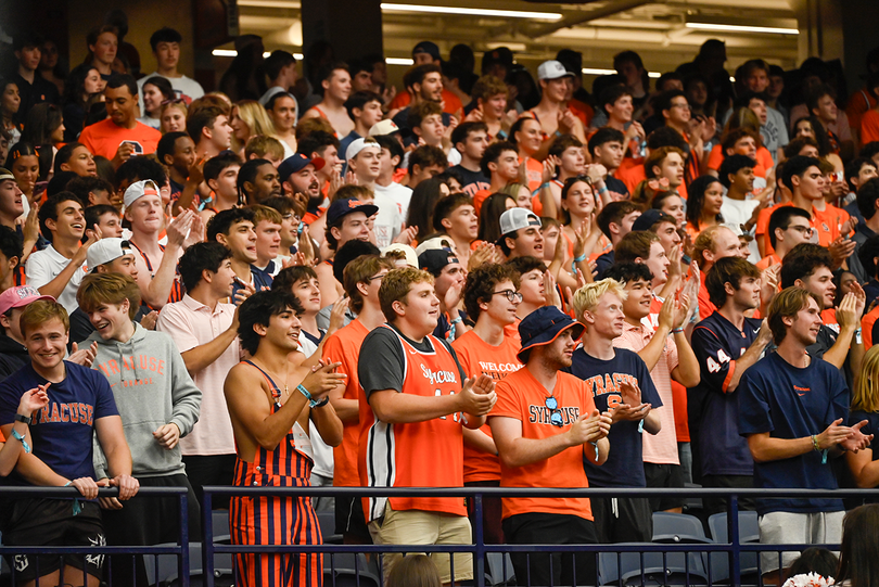 During Syracuse football's season-opening game against New Hampshire, SU fans don Orange merch and colors. A popular game day garment is orange and blue overalls, known for their comfort while showcasing the school’s colors.
