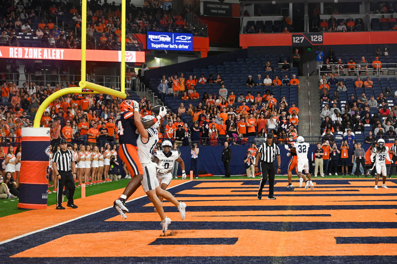 Syracuse tight end Elijah Washington-Baker reaches for a pass in the end zone during SU’s 66-3 win over New Hampshire at the JMA Wireless Dome on Sept. 5. Orange quarterback Steve Angeli threw for three passing touchdowns in the win.