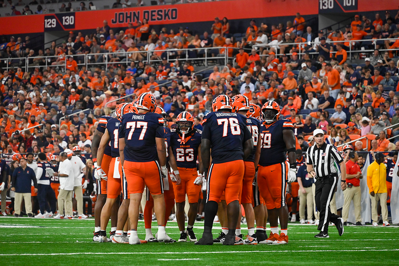 Syracuse huddles during its 66-3 win over New Hampshire on Sept. 5. The Orange now turn to Cal Saturday in their first ACC contest of the campaign.