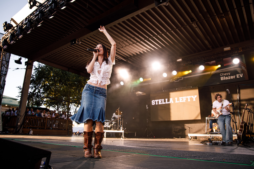 Stella Lefty dances and sings at the Fair’s Chevy Court on Sunday. Along with staples like “Boston,” Lefty also covered Natasha Bedingfield’s “Unwritten.”