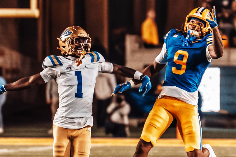 Ian Strong (9) rises for a ball over a UCLA defender in Cal's season-opening loss on Sept. 5. Strong finished that game with 94 receiving yards and will look to terrorize Syracuse on Saturday.