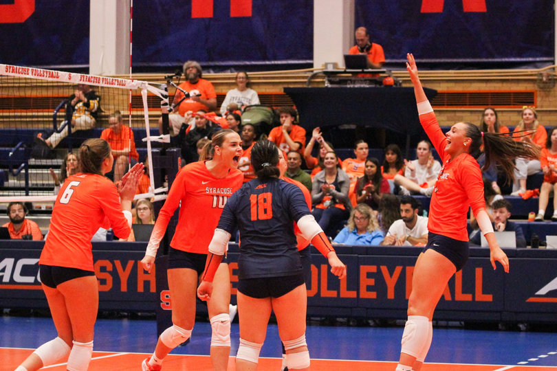 Syracuse volleyball celebrates winning a point in its 3-1 loss to Arkansas Wednesday. With the defeat, the Orange dropped to 3-3 on the season.
