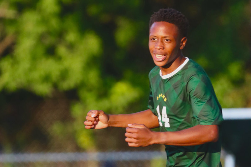 Jude Page-Fagon pumps his fists while playing for Hamilton Central High School. The sophomore has become one of the Emerald Knights' top players this season, totaling 10 goals and four assists in five games.