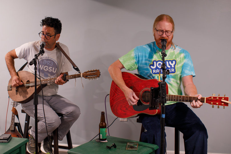 Uncle Jason’s Band members James Fingerman and Robert Searing strum their guitars while practicing in Fingerman’s house. Tribute bands like Uncle Jason’s Band continue to keep Grateful Dead’s legacy alive.