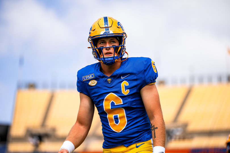 Mason Heintschel warms up before starting under center for Pitt. The Panthers’ quarterback leads Pitt into a matchup against Syracuse on Thursday.