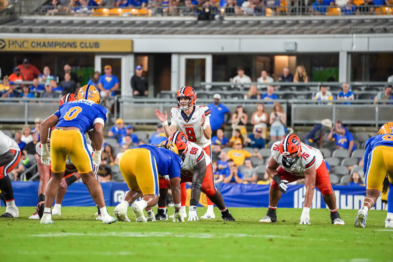 Syracuse quarterback Steve Angeli readies for a snap under center during a 27-13 loss to Pittsburgh Thursday. The signal-caller was benched for Amari Odom after tossing two second-half interceptions.