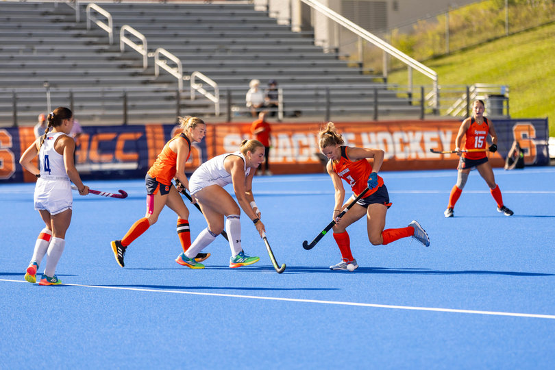 Taylor Bigbie tries to maintain possession during Syracuse’s 3-2 win over UMass Lowell on Sept. 18. Bigbie has been a vital part of SU’s penalty corner defense in 2026, which has stopped 45 of 46 corners.