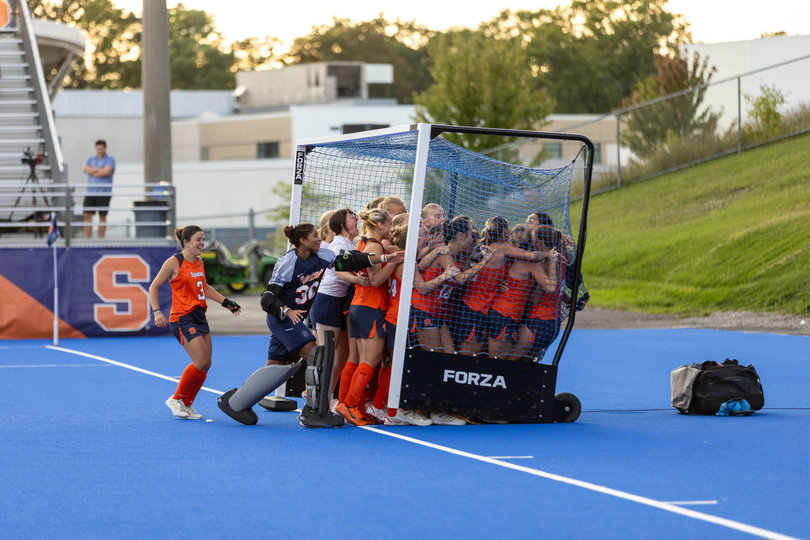 Syracuse field hockey celebrates in goal after winning in a shootout over UMass Lowell on Sept. 18. SU improved to 5-1 on the year with its home-opening victory.