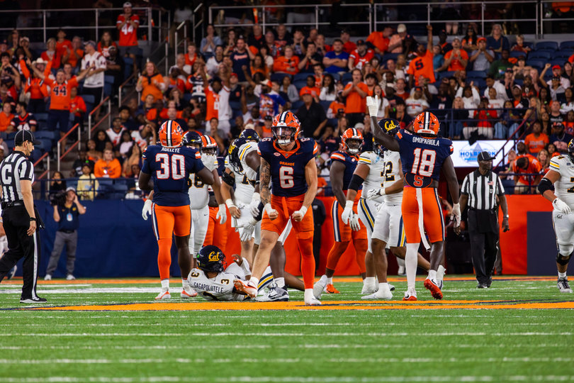 Chris D’Appolonia flexes during Syracuse’s 21-18 loss to Cal on Sept. 12. Since transferring from Toledo to SU, D’Appolonia has become one of the Orange’s top defensive players.