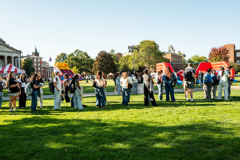Students wait in line to fill stuffed animals at Quad-A-Palooza Friday. The event came after the cancellation of Juice Jam.