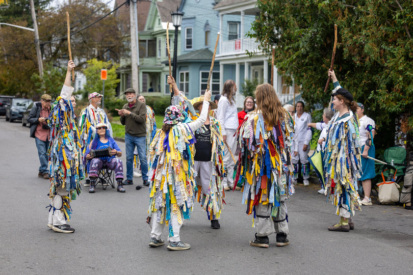 A group of Thornden Morris Dancers performs on a Westcott-University neighborhood street Sunday at the Westcott Cultural Street Fair. This year’s fair featured 140 vendors. 