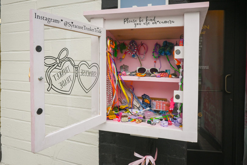 The "trinket box" outside Westcott Barber Shop holds friendship bracelets, hair ties and more. Melissa Spangenberg, the shop's co-owner, thought of the idea after seeing TikToks of trinket boxes.