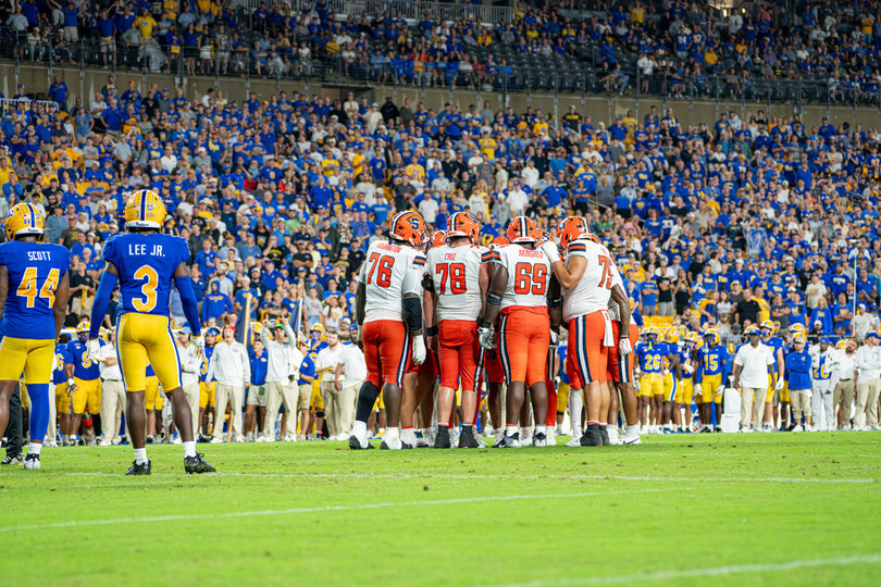 Syracuse football huddles during its 27-13 loss to Pitt on Sept. 17. After a 1-2 start to the season, the Orange travel to face UConn for their second nonconference matchup of the campaign.